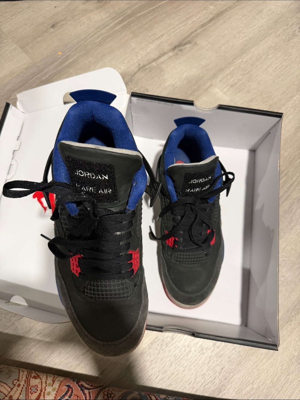 Jordan Men’s Black/Blue Basketball Sneakers with Red Accents